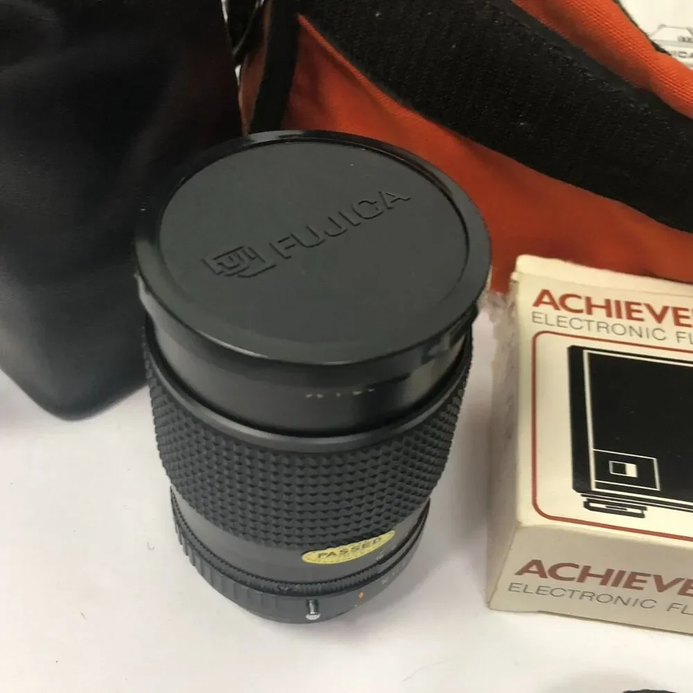 VTG Fujica AX-35mm SLR Camera w/ Bag Extra Lense Achiever Electronic Flash Bulbs